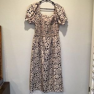 Flirty cheetah inspired midi dress with slit